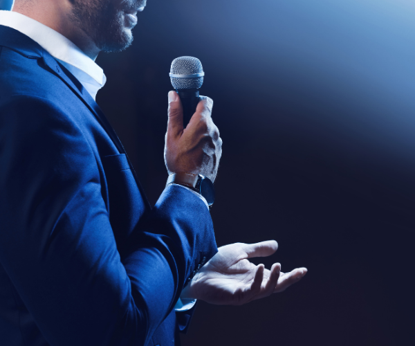 Host journalist interviewing VIP at event